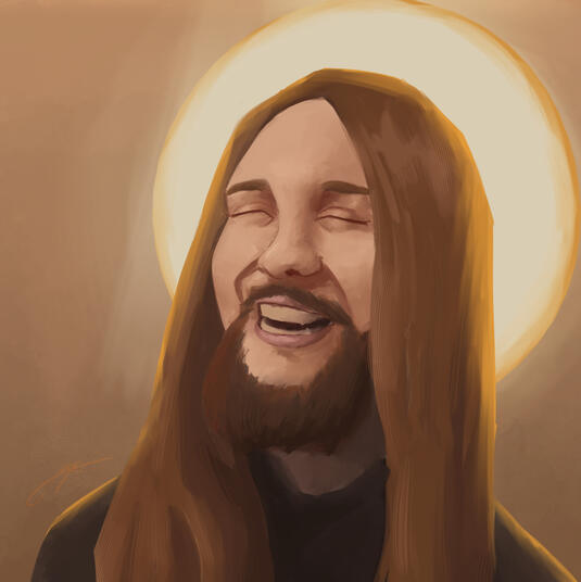 A portrait of a laughing, bearded man with long hair accompanied by a bright ring of light behind his head